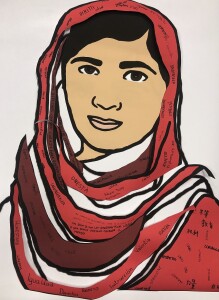 Uno dei cartelloni realizzati dalle classi quarte della Primaria con il ritratto di Malala Yousafzai. 